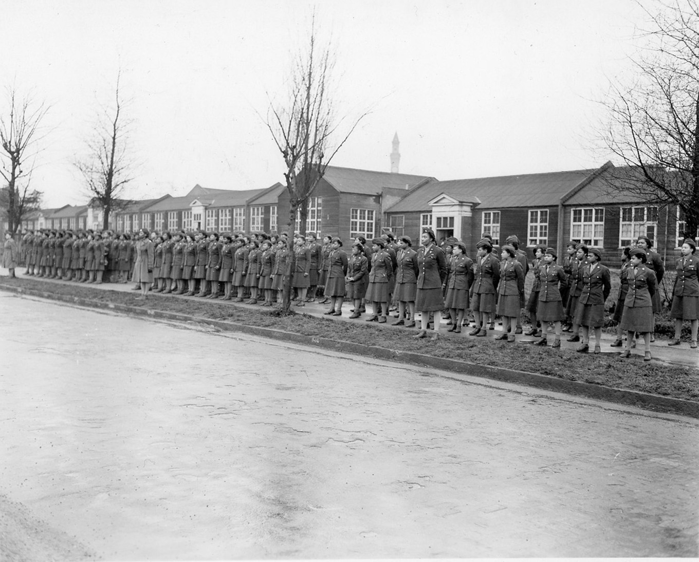 A line of women Soldiers stand ready for inspection.